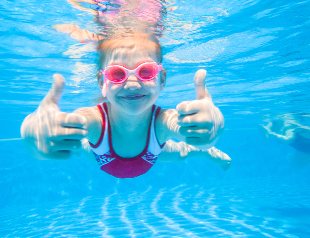 Kid in swimming pool